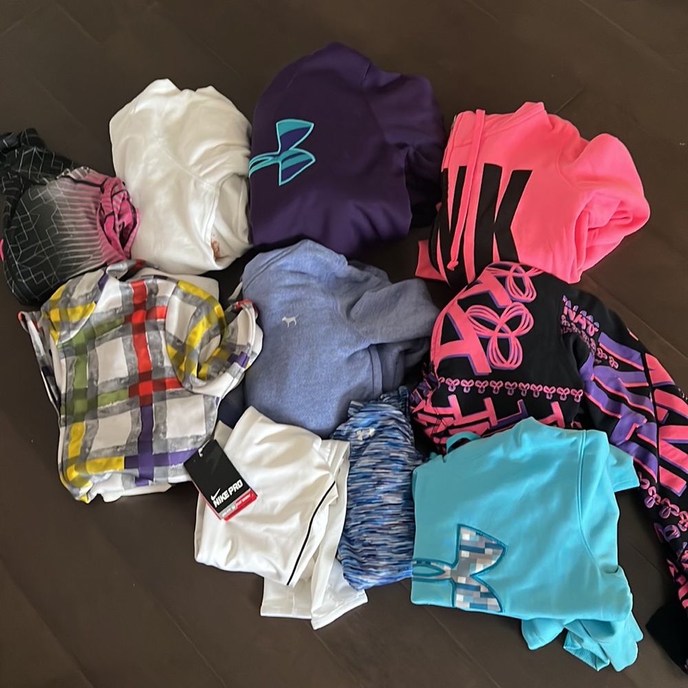 Womens size small and extra small athletic top and sweater lot.